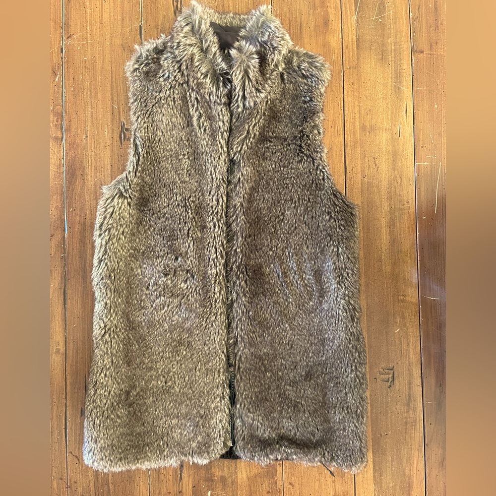 Faux (fake) fur brown vest.